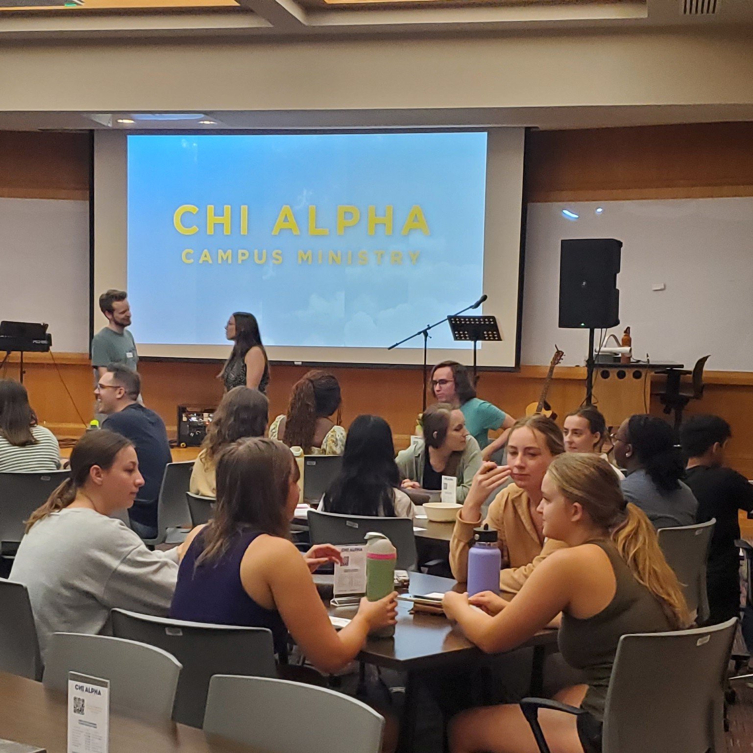 Group of students discussing at Chi Alpha Rally