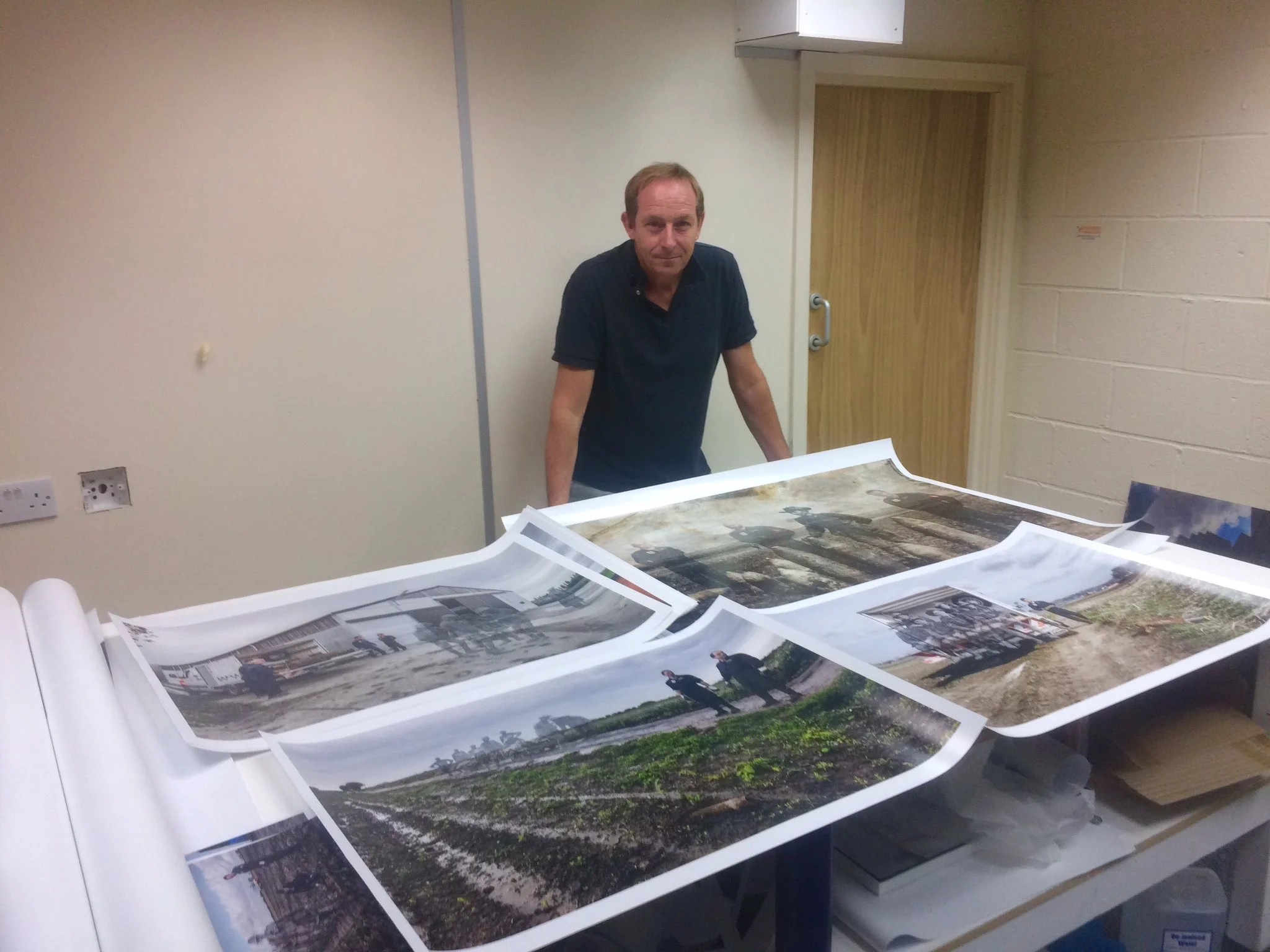 Artist Ian Alderman with the prints destined for the Australian debut of ‘Recovering The Past’