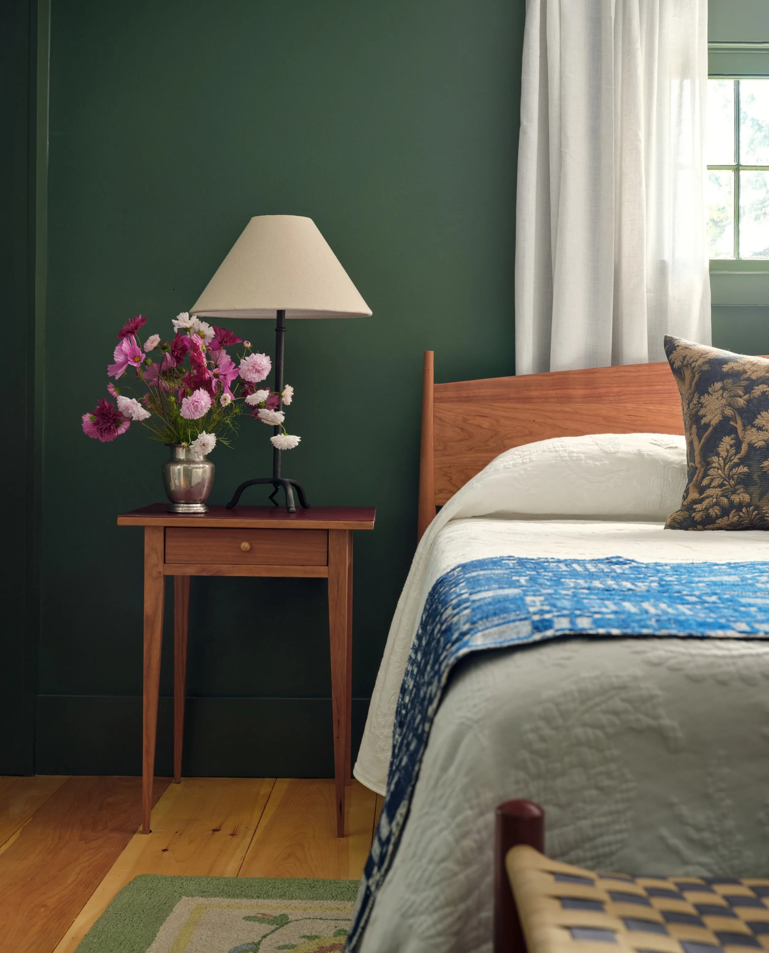 We carved the back bedroom at Kimball-Chandler out of the old woodshed. The goal was to create a cozy, restful space tucked away and overlooking the stream. Everything here is new construction, but we wanted it to feel at home with the rest of the ho