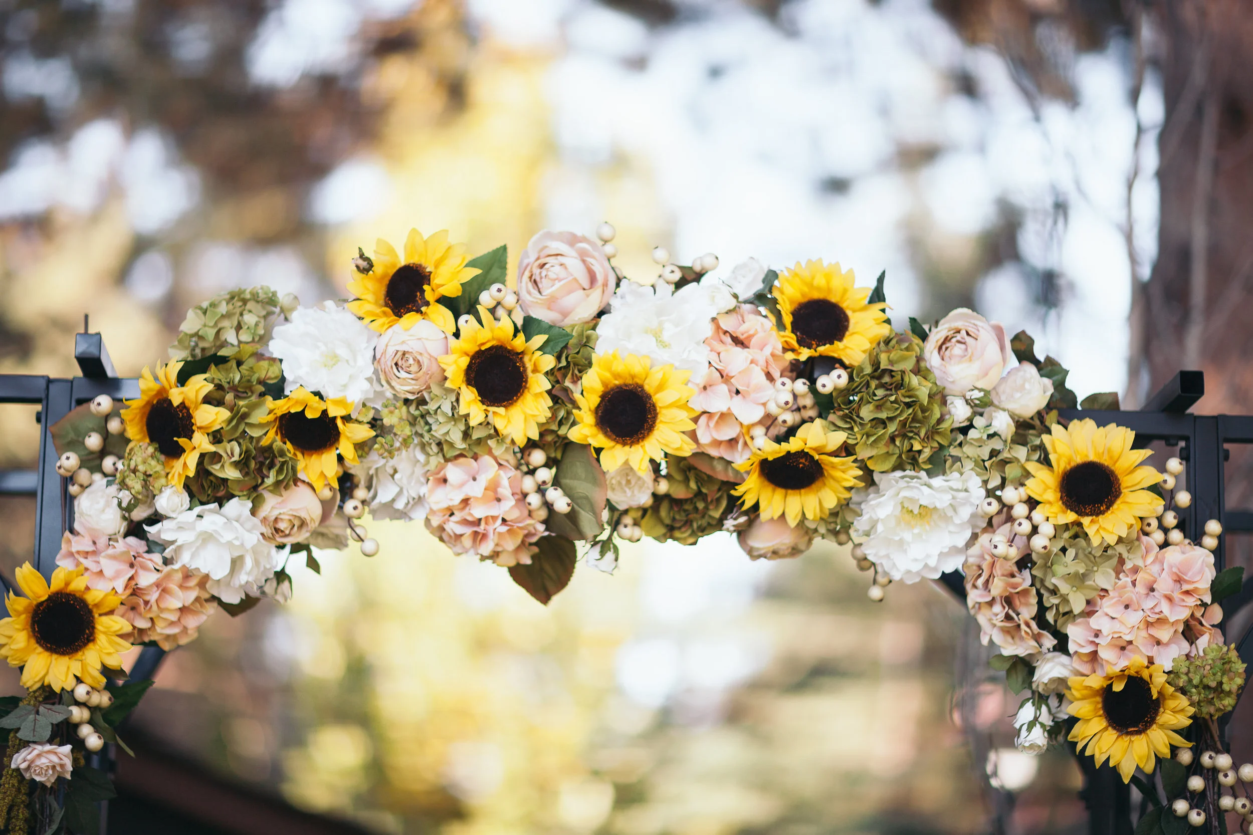 My older sister, Katie created this from flowers from a craft store. This is what we stood under when we greeted guests.