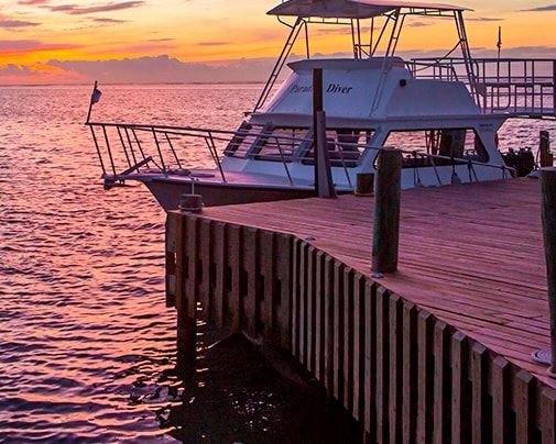 cayman-brac-dive-boats-and-staff-tile.jpg.jpeg