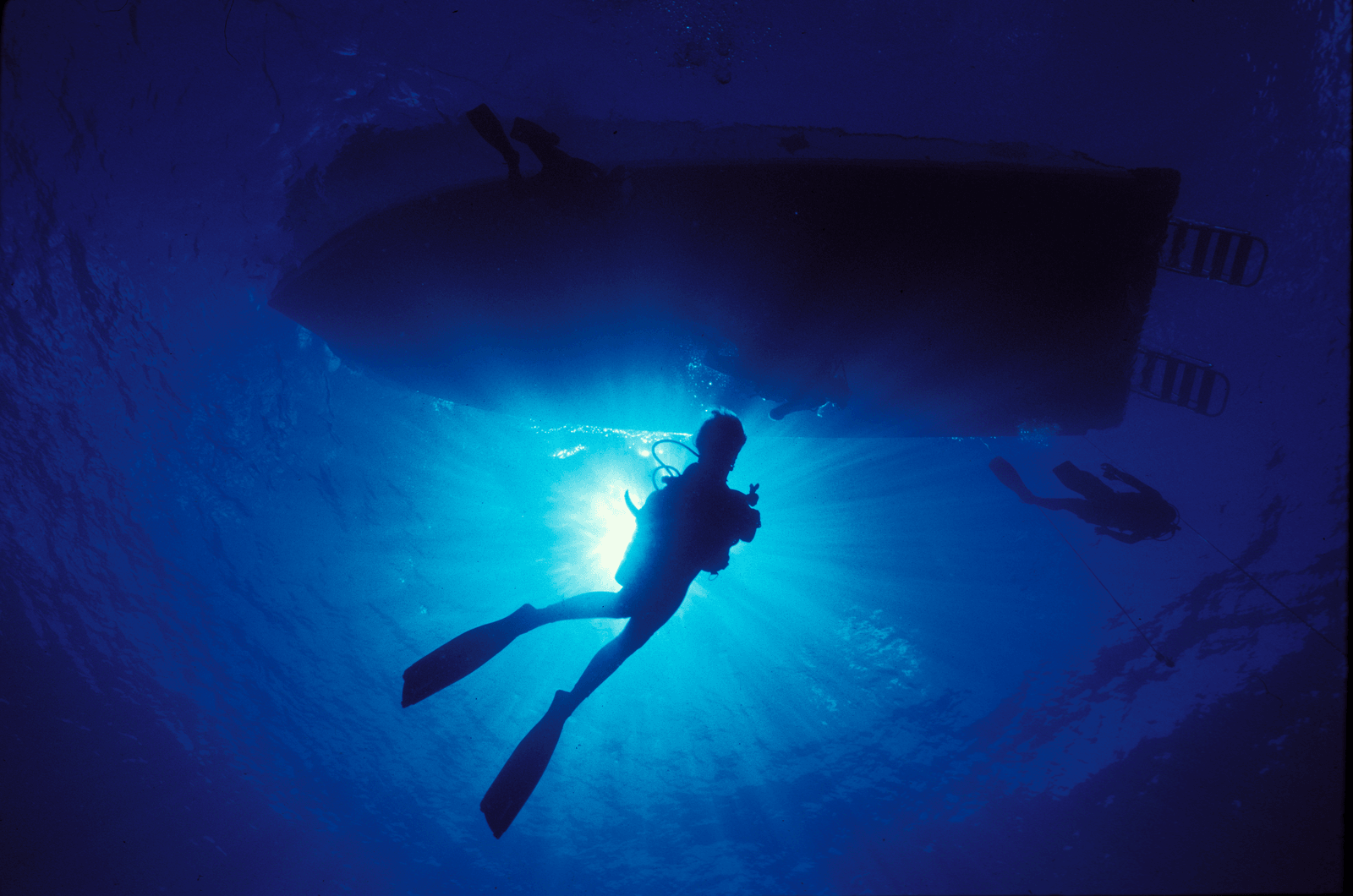 Diver-Under-Boat-medium.png