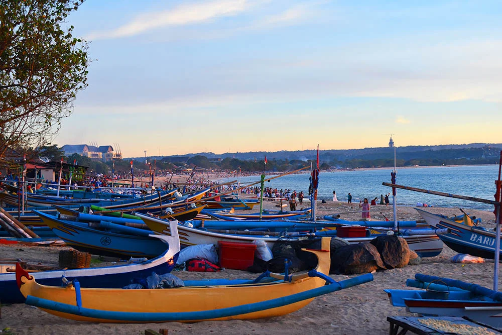 We spent one afternoon here on Jimbaran beach, and were lucky enough to catch this sun set with all these colorful fishing boats lined up along the shore.