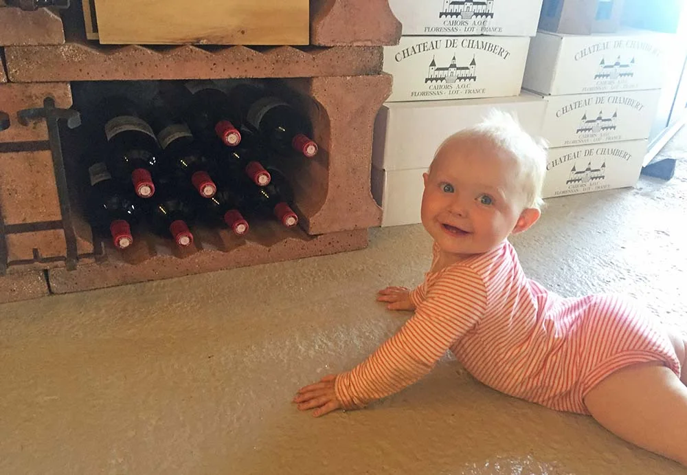 Rosie exploring the wine selection at Chateau de Chambert!