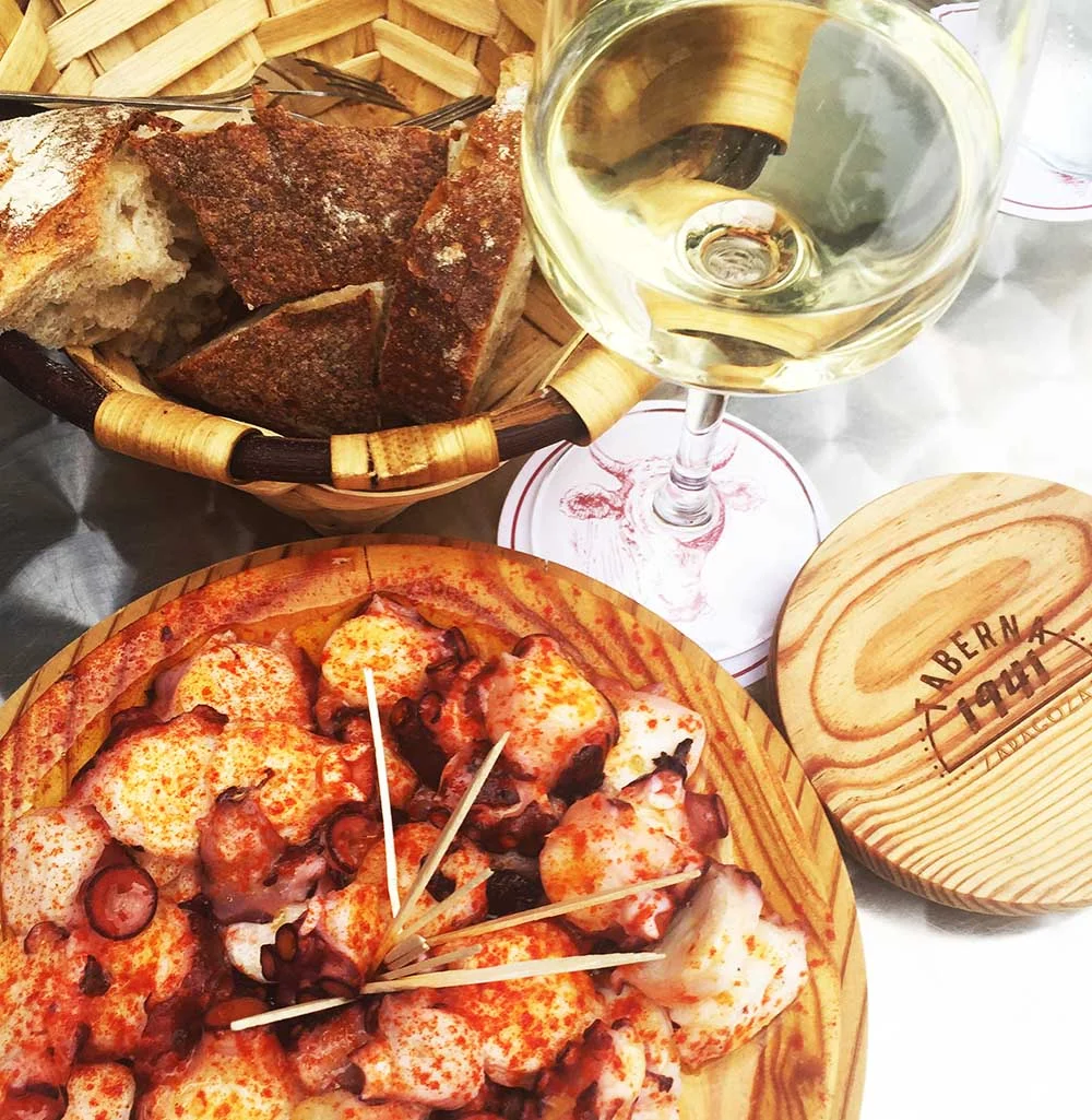 A delicious lunch of tender octopus sprinkled with paprika. We ate a lot of Octopus in Spain!