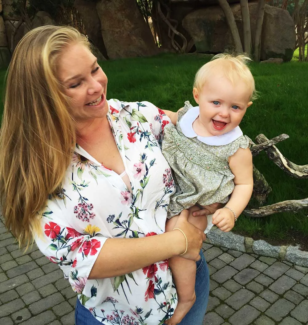 Rosie and I on her first birthday at the amazing Biopark . She loved the giraffes!