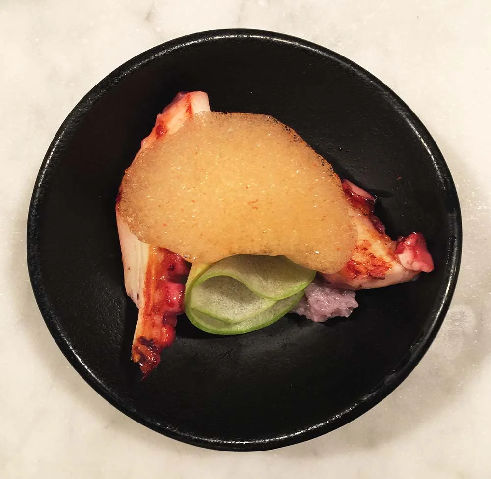 Creative pintxos at A Fuego Negro. Grilled octopus/green apple/violet potato/red air! 