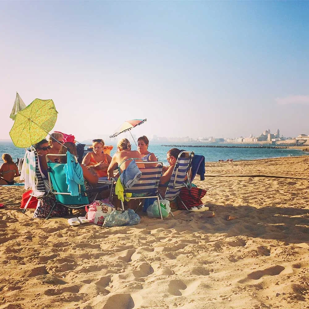 This gaggle of ladies on the beach in Cadiz made my heart sing. They were playing cards and having a blast!