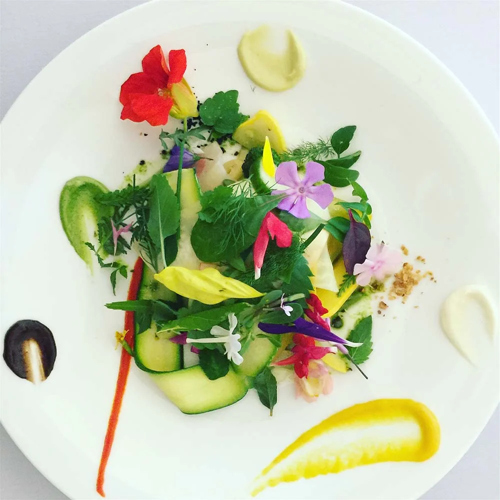 September 2016: Laguiole, France. This is the signature dish at Maison Bras, my favorite meal of all time. This 'salad' is composed of 60-80 elements (depending on the produce of the day), and made entirely from seeds, herbs, flowers, and vegetables grown on the family farm. 