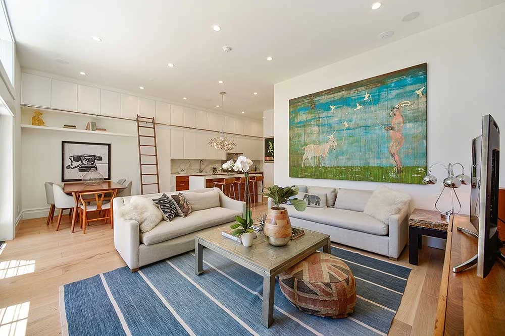 The sofas were custom made by Restoration Hardware, in Belgian linen. Amazingly they have survived many parties and red wine stains. Go figure?!