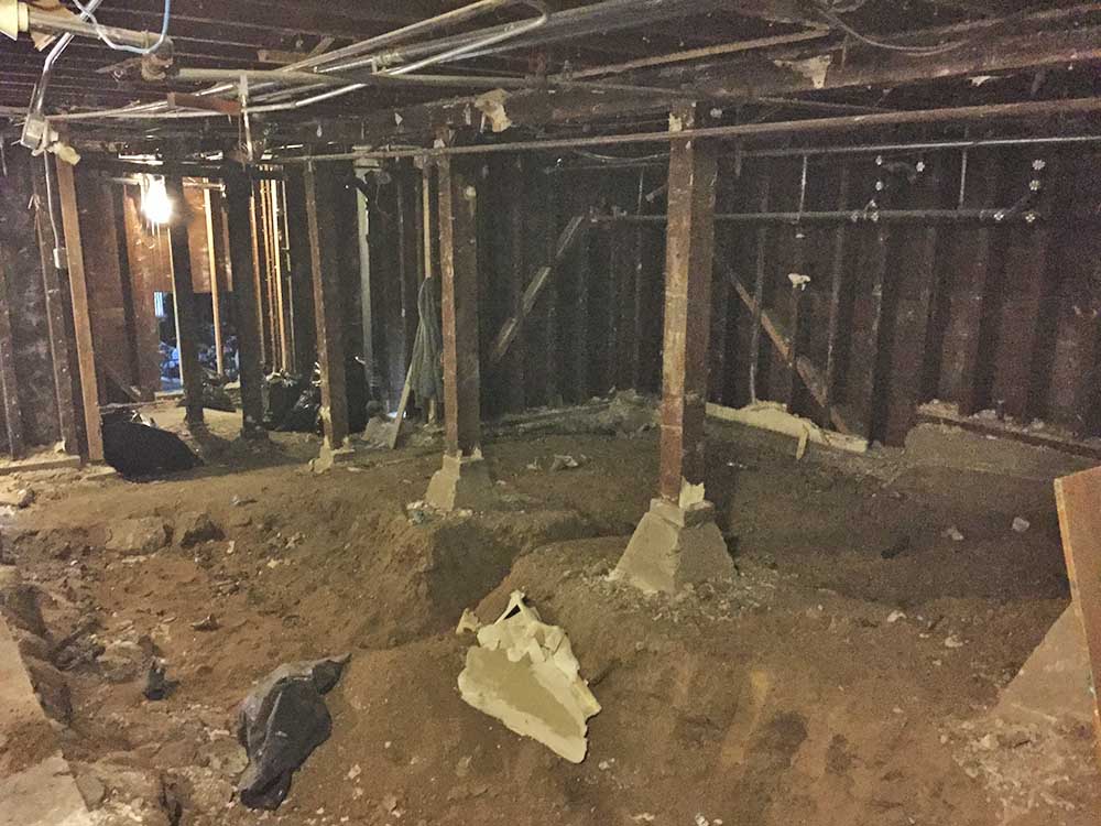 Lots of excavating to get the head height we needed. 