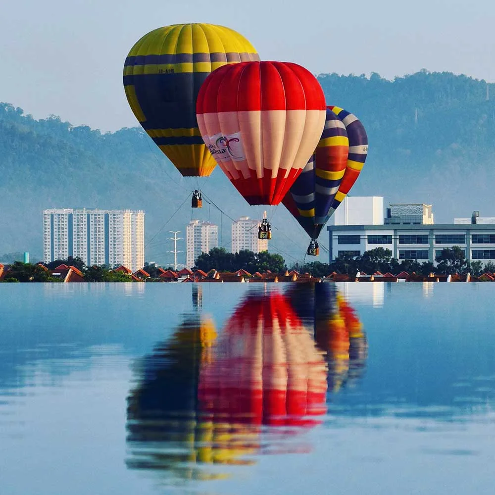 March 2016: Kuala Lumpur, Malaysia. Visiting Justin's sister and family, followed by a road trip to Malacca . These hot air balloons were such an amazing sight, with the city of KL in the distance. 