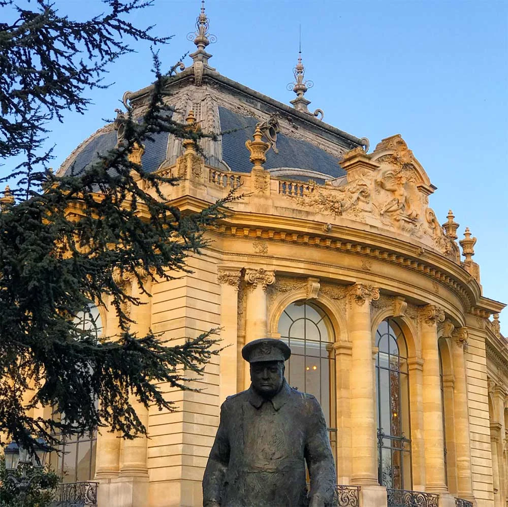A commanding statue of Winston Churchill outside the Petit Palais.
