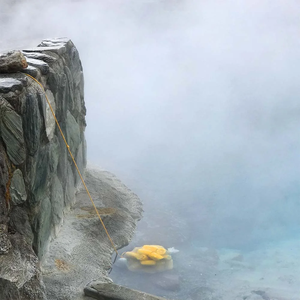 Our corn being cooked. Apparently these geothermal waters are rich in all sorts of healing minerals.