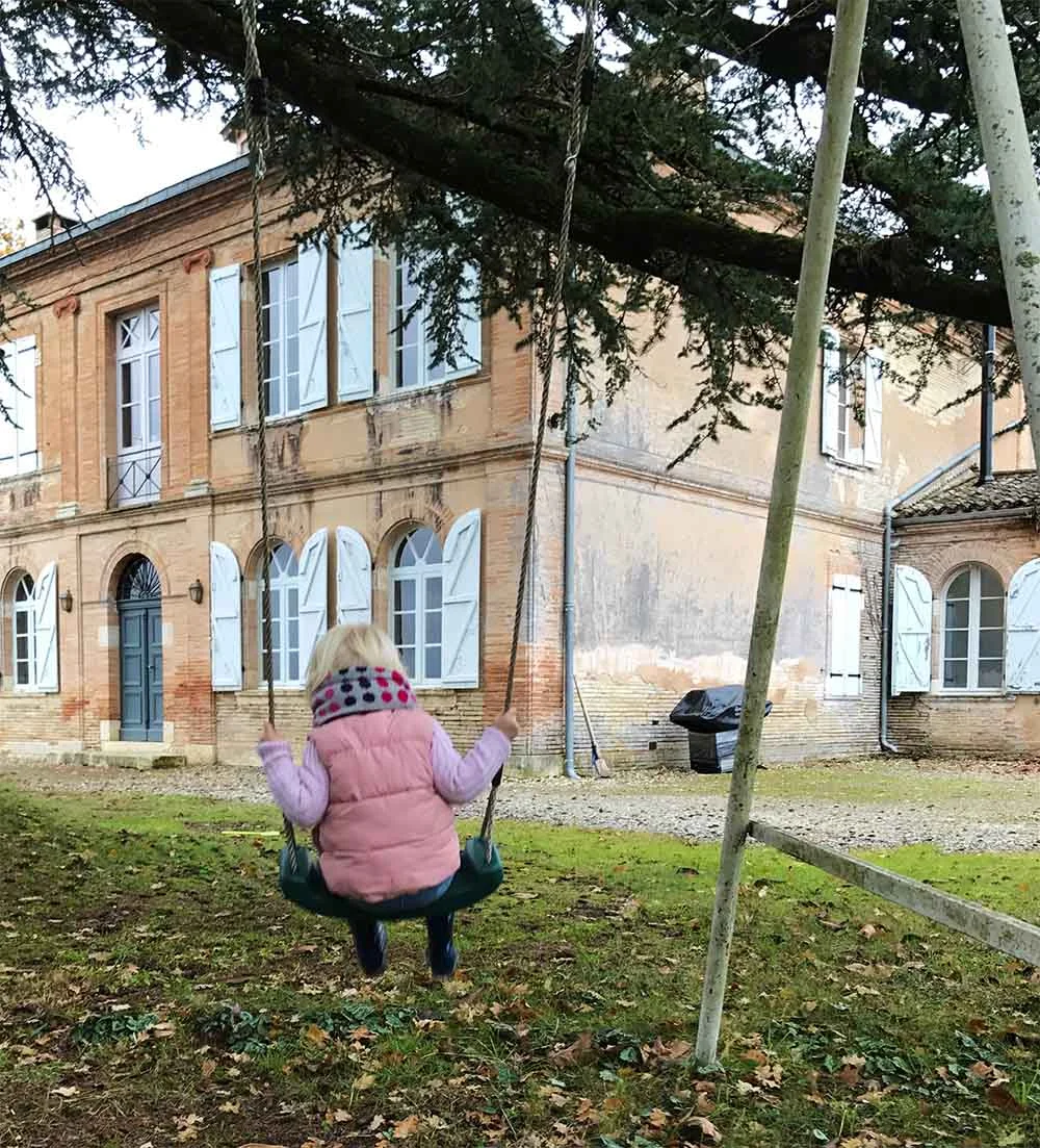 The previous owners left behind their swing - you can imagine Rosie's glee. 
