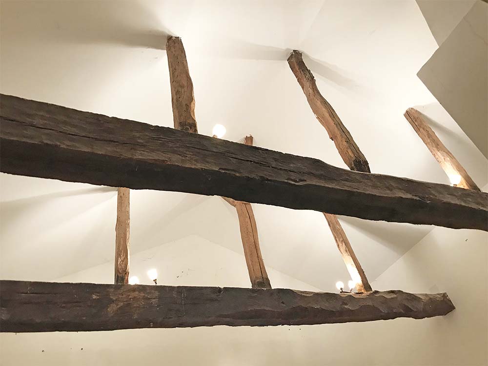 The vaulted ceiling and exposed beams. 
