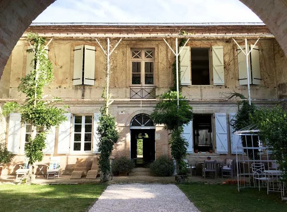 A view of the back of the main house from the walled courtyard. 