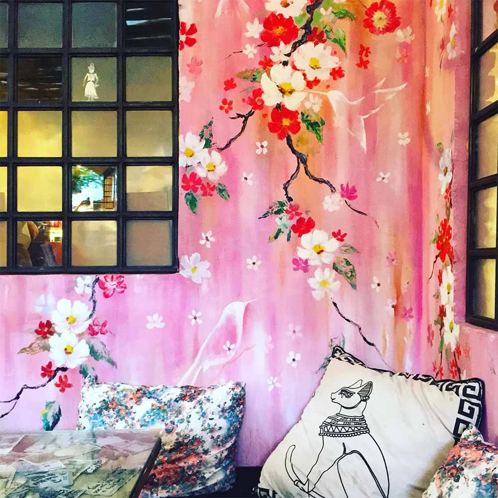The hand-painted interior by @kf_paintings at Revolver Cafe in Seminyak.