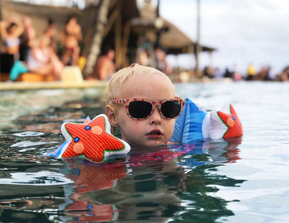 Rosie swimming like a boss with her new floaties. 