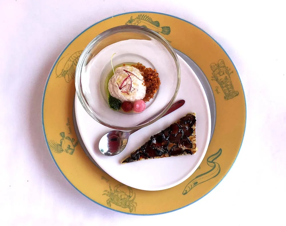 Sliced black truffle on toast, served with smoked fish and roe at Le Miramar .