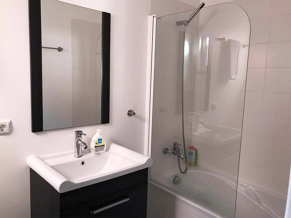 The bathroom is compact, but it's also clean and functional. 