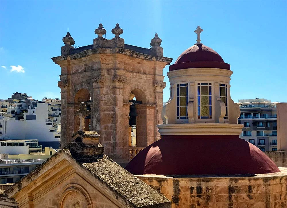 A juxtaposition of rooftops.