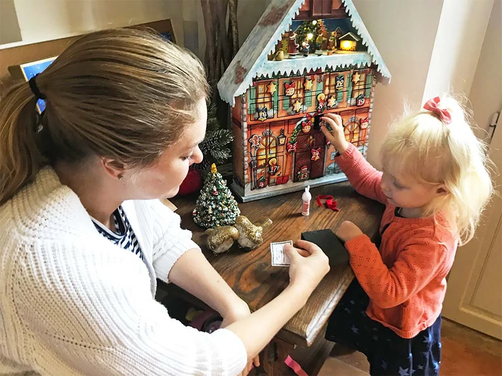 We bought this calendar at the Berlin Christmas Markets last year , and each time you open one of the doors, music starts and the little people at the top start dancing. It’s so cute.