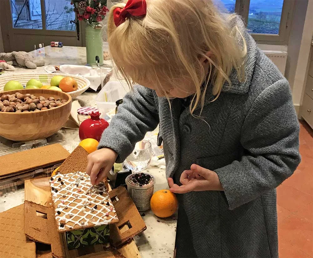 Rosie didn’t care that her gingerbread house had collapsed. We balanced the roof on a tissue box and she bedazzled it just the same.
