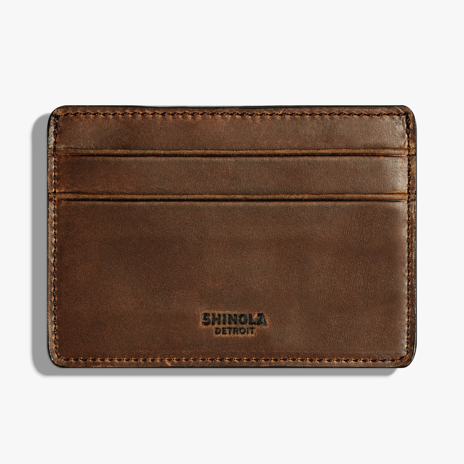 Classic and slim for dad. Wallets by Shinola .