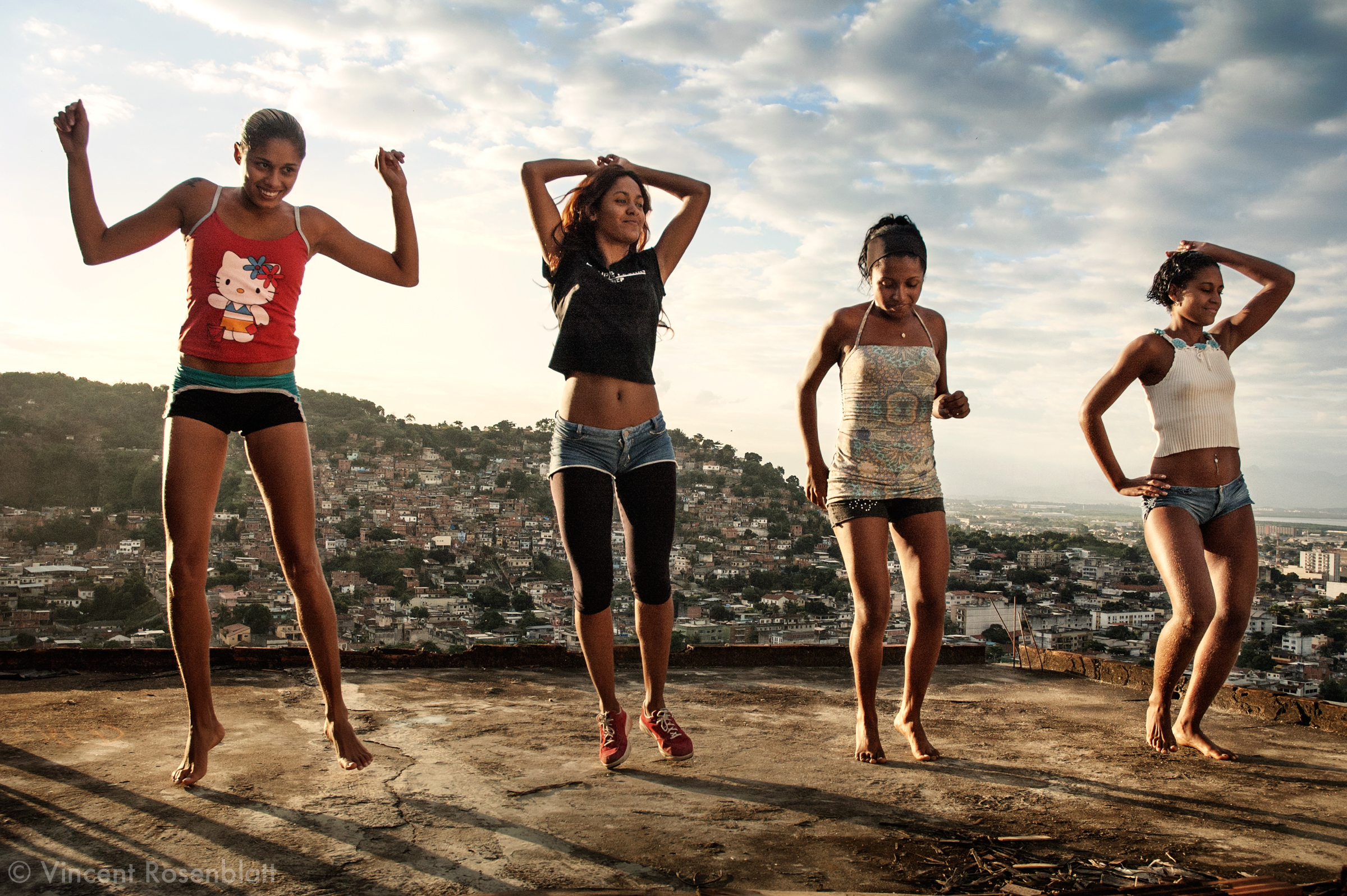  Funk on the rooftops. Elaine, Cris, Aninha & Dani, of the "Tchutchucas" band, are rehearsing their new choreography on the rooftop of Elaine's house in the Vila Cruzeiro favela, Rio de Janeiro. Their spicy rap responds to the MCs'macho attitude. 