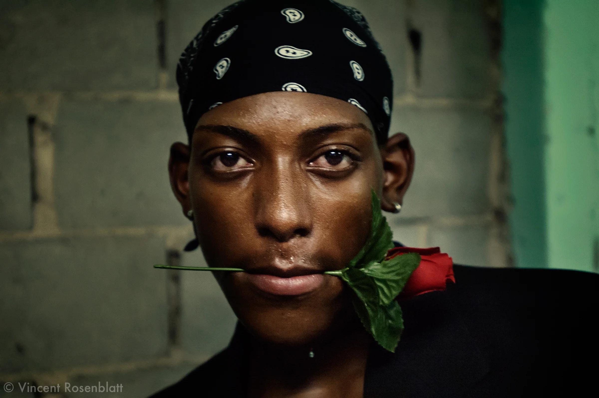 Funk ball in Belford Roxo, near Rio de Janeiro. This funk dancer is using a rose, symbol of the boys band "The Don Juans", famous for their romantic raps..