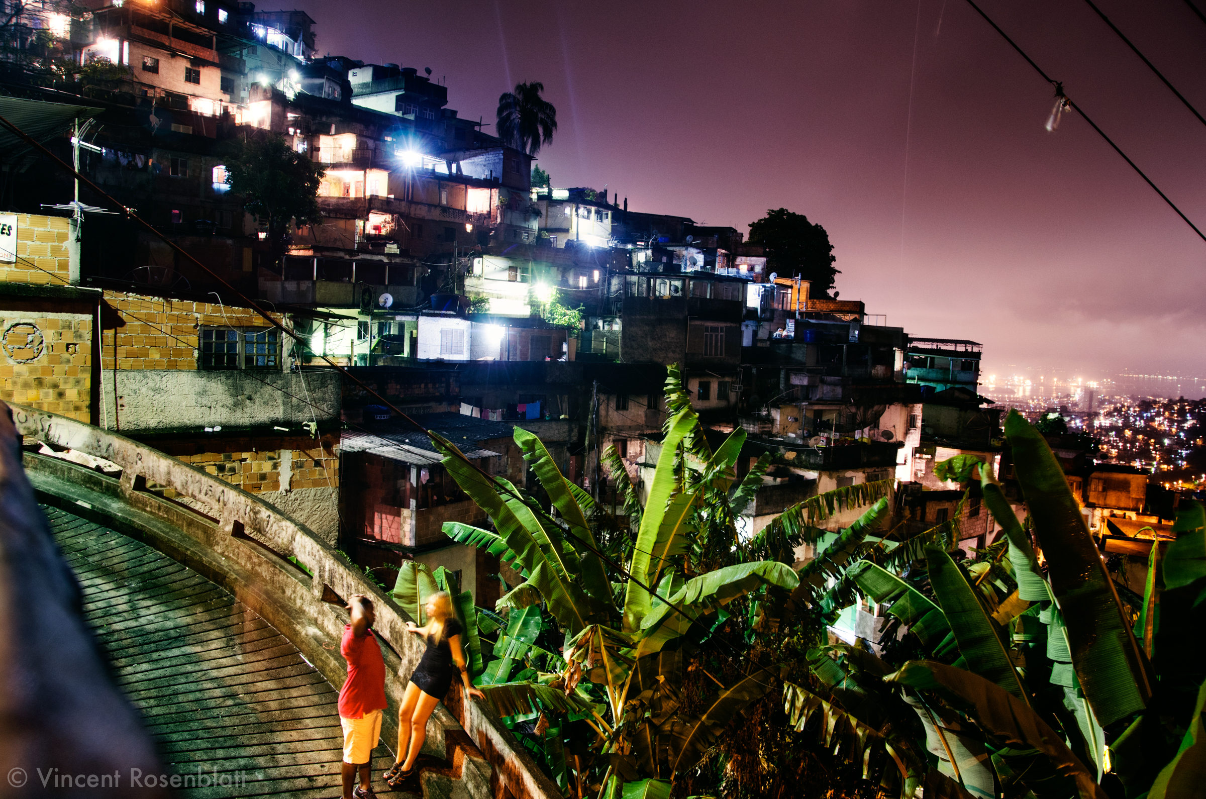  A young couple in the favela Morro dos Prazeres, in the Santa Teresa borough. aside from the Baile Funk happening in the near ... at least 500 persons have been dancing all night on the top of the hill.. 