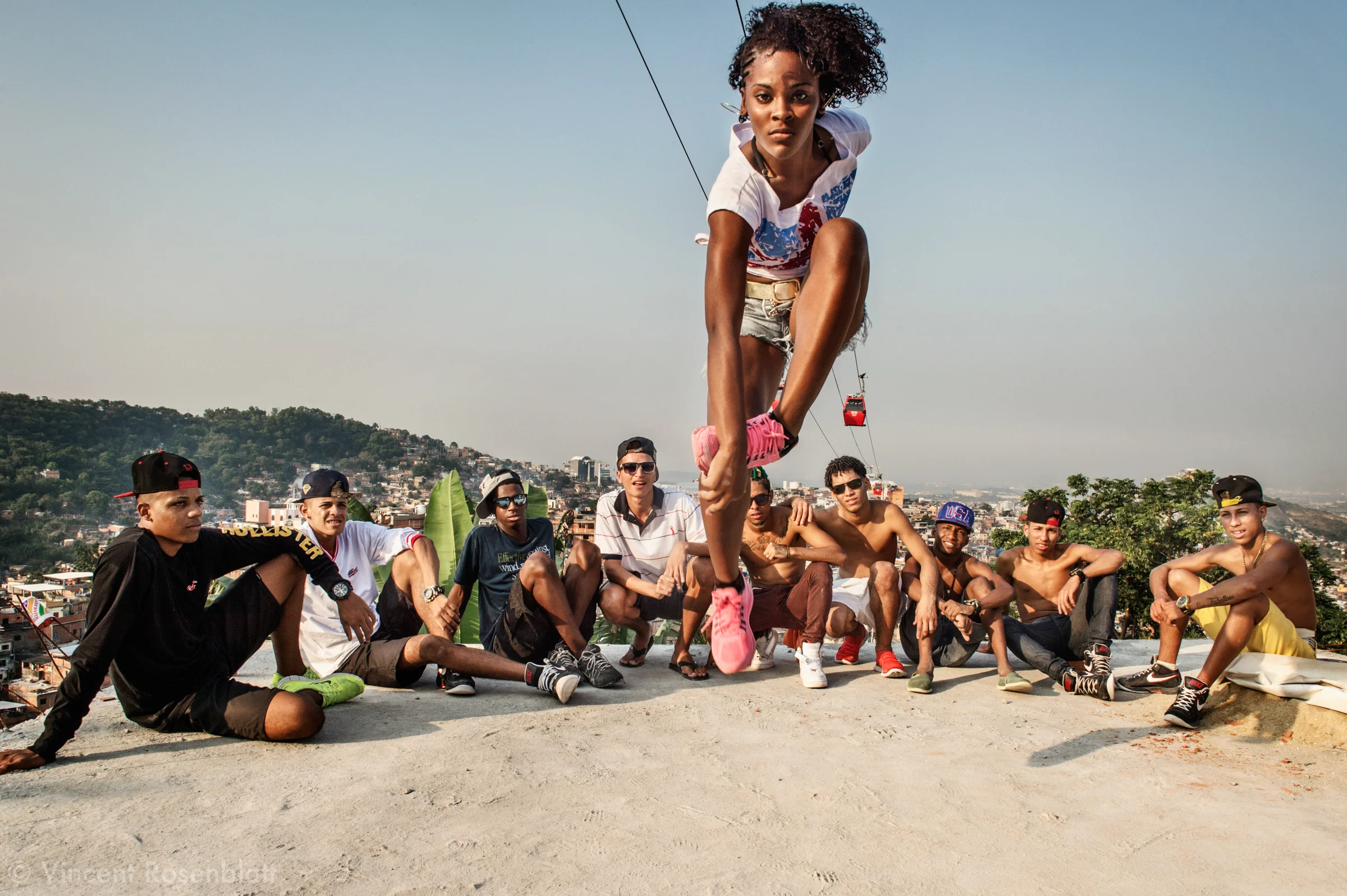 Celly IDD - the most renowned female dancer from “Passinho” funk dance.. Rehearsal of the show "Na Batalha" on a rooftop of the Complexo do Alemão favelas. Elite dancers of the "Passinho" (little step) the newest dance fiever that came out the Baile Funk culture.