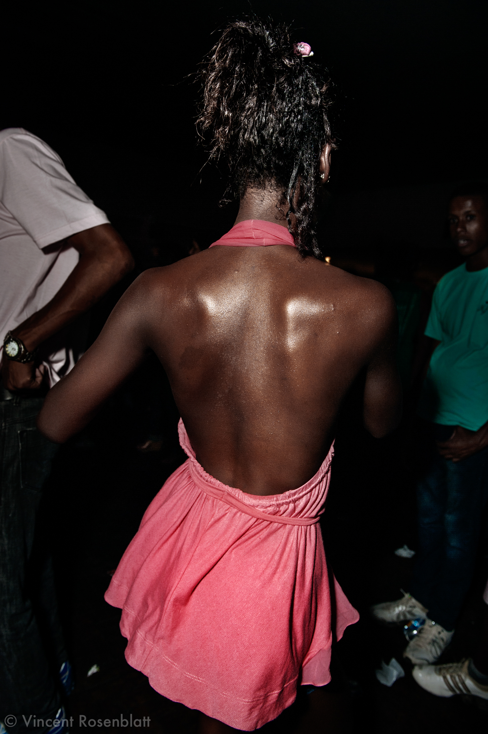  "Funkeira" at the Ramos Social Clube, close to the Complexo do Alemão's favelas, Rio de Janeiro 2009. In the heat of the "baile". 