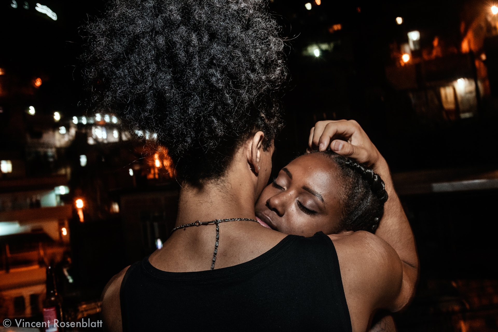  Urban dancers, favela of Borel, Tijuca, North Zone of Rio de Janeiro. Hug after the shooting of "Me Solta" video music by MC Nego do Borel. 