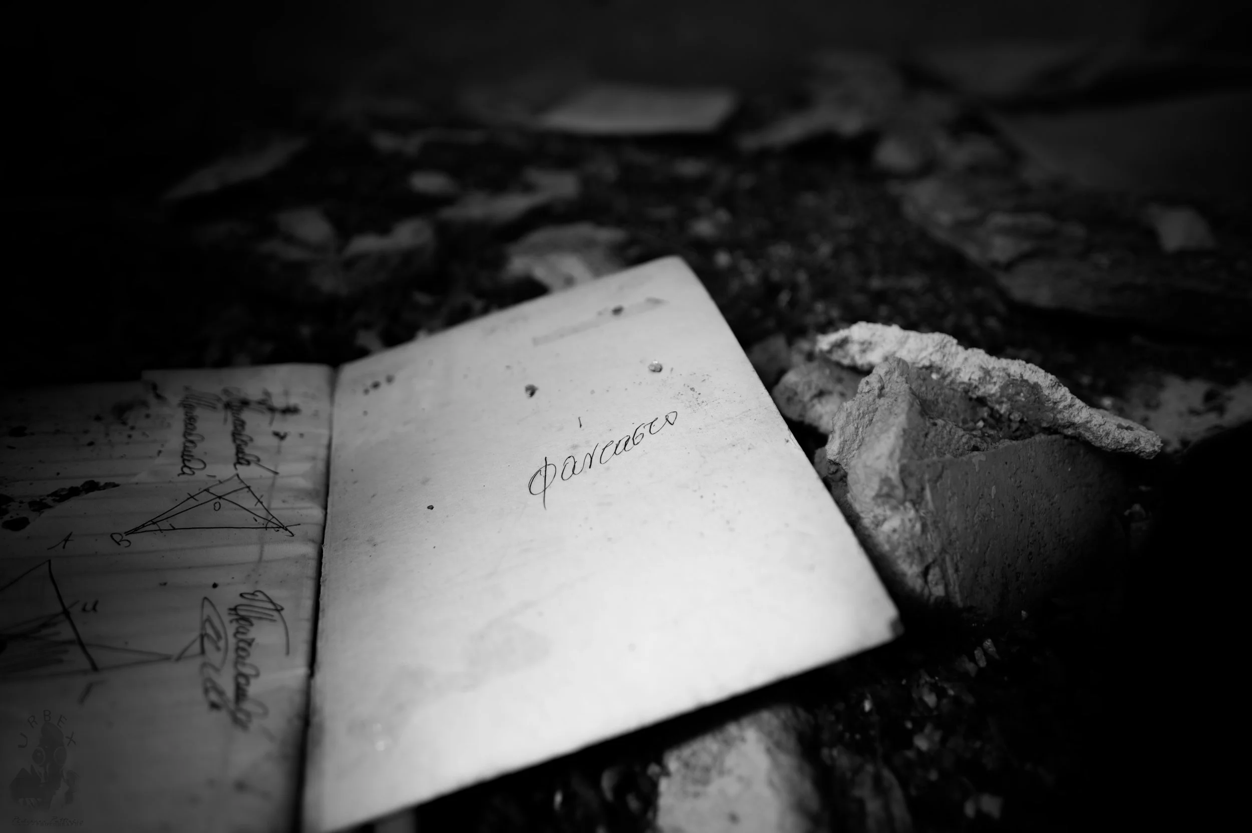Φαντασία

An old school notebook lies open in the dust.
On the page, a single word remains:

Φαντασία.

Imagination once filled this room.
Now only silence turns the pages.