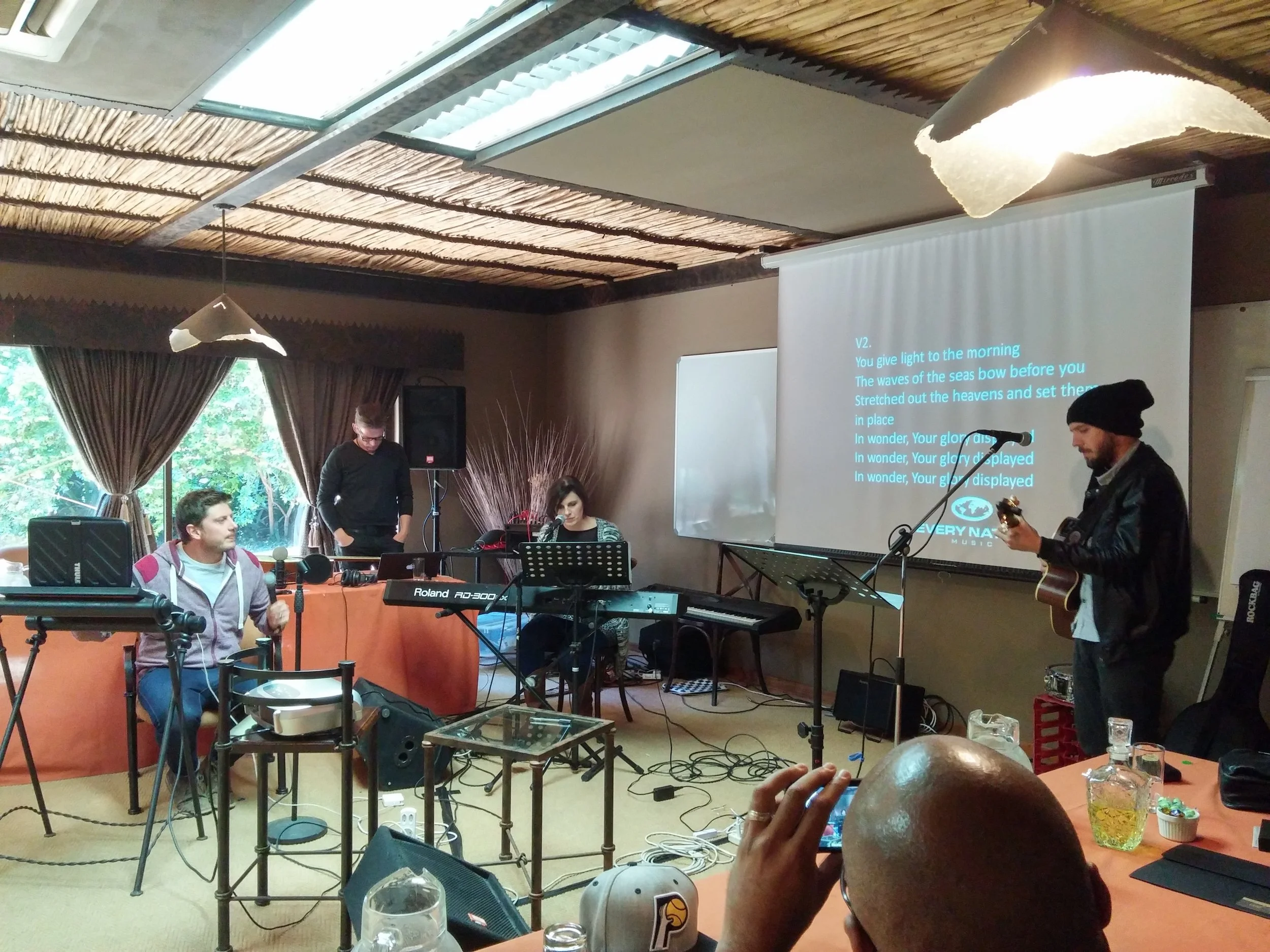 Writers -present their song, "We Stand In Awe", -at the Worship Writers' Workshop in Pretoria, South Africa.