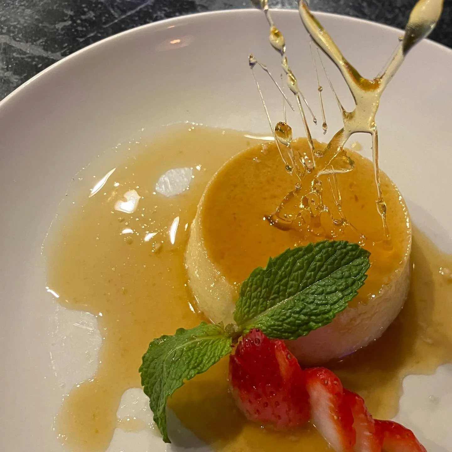 Coconut Flan with Orange Caramel. On our dessert menu this week! Venture out in this balmy weather and join us for dinner. ☀️