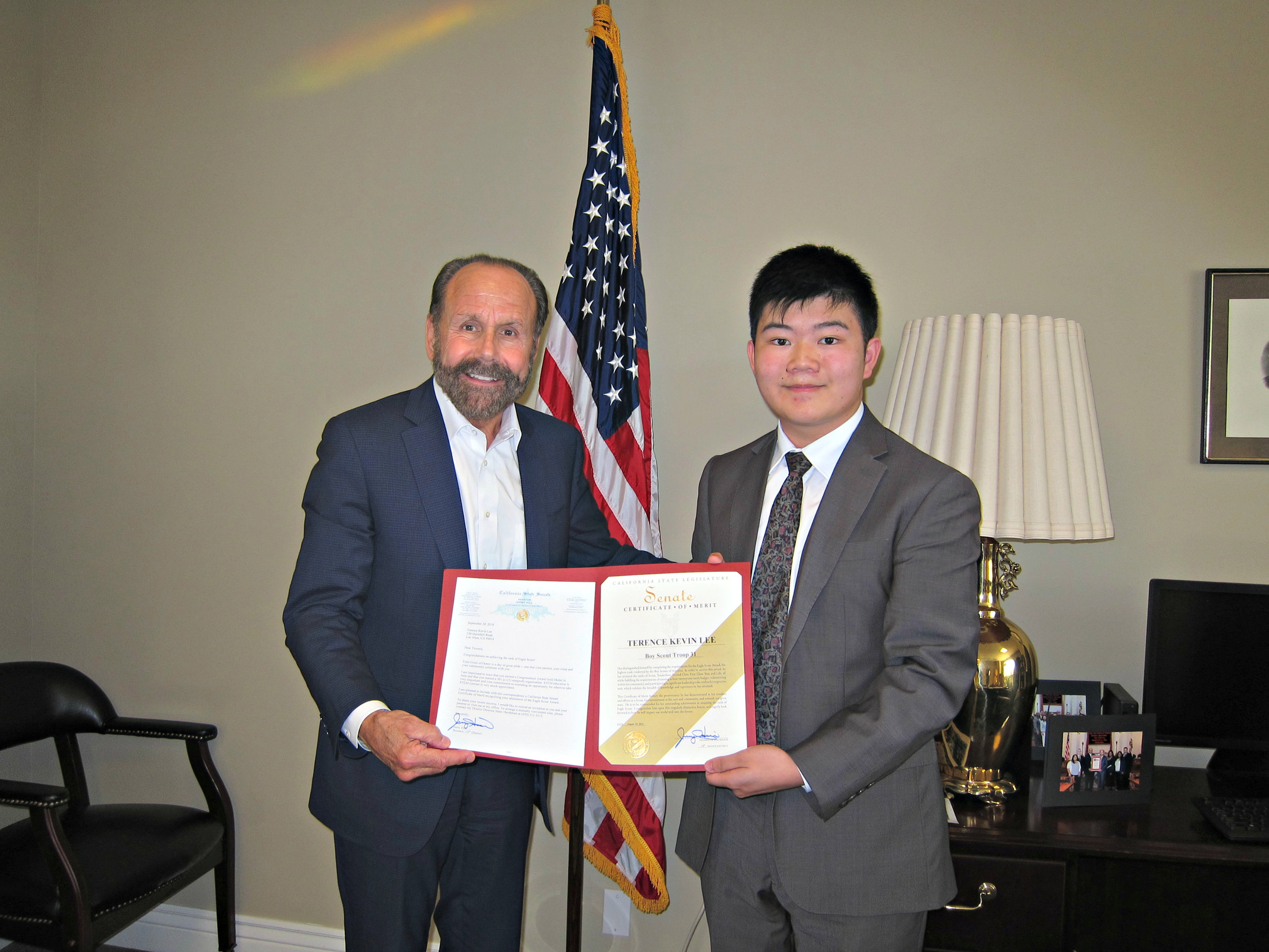 Senator Jerry Hill (left) presenting Certificate of Achievement to Eagle Scout Terence Lee (right)