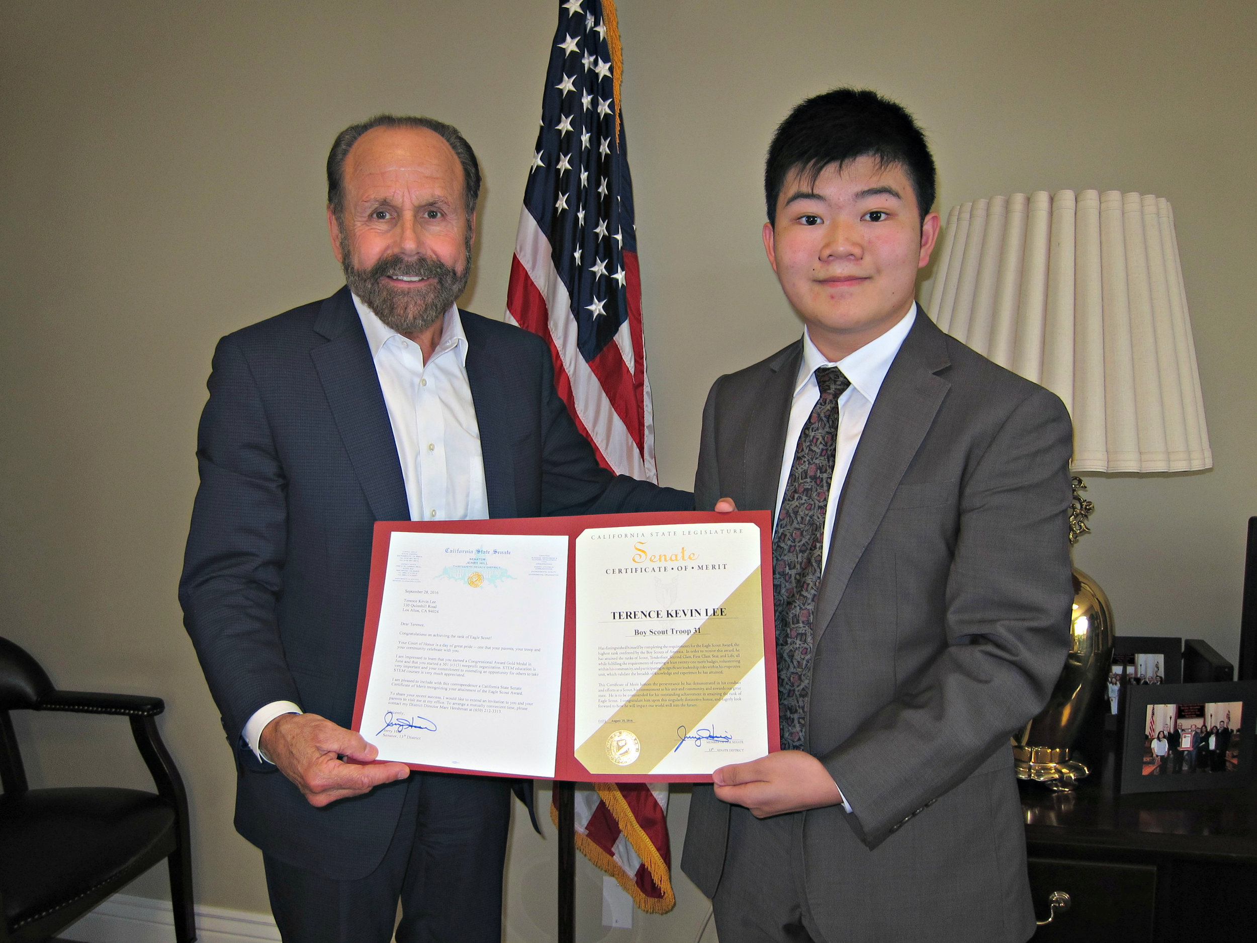 Senator Jerry Hill (left) presenting Certificate of Achievement to Eagle Scout Terence Lee (right)