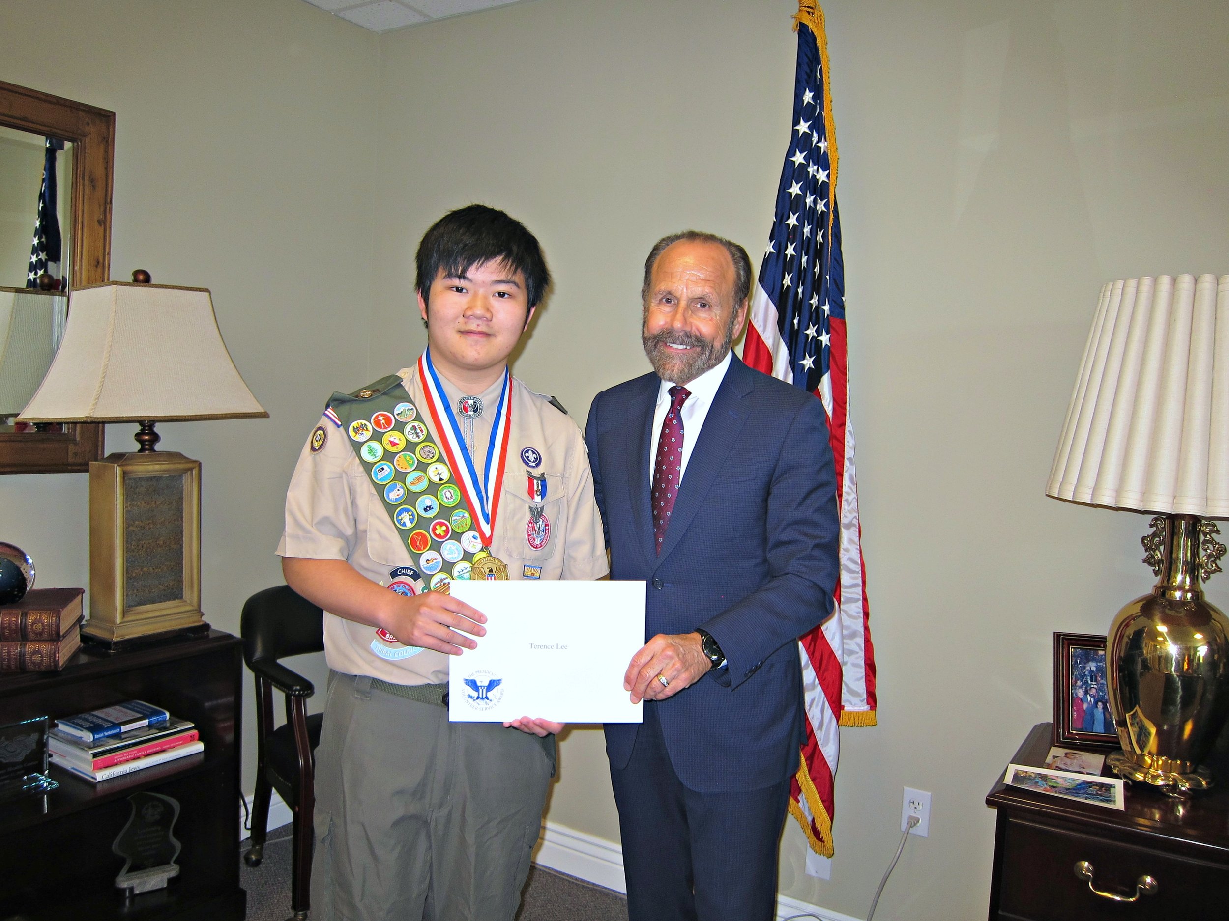 Terence Lee (left), Senator Jerry Hill