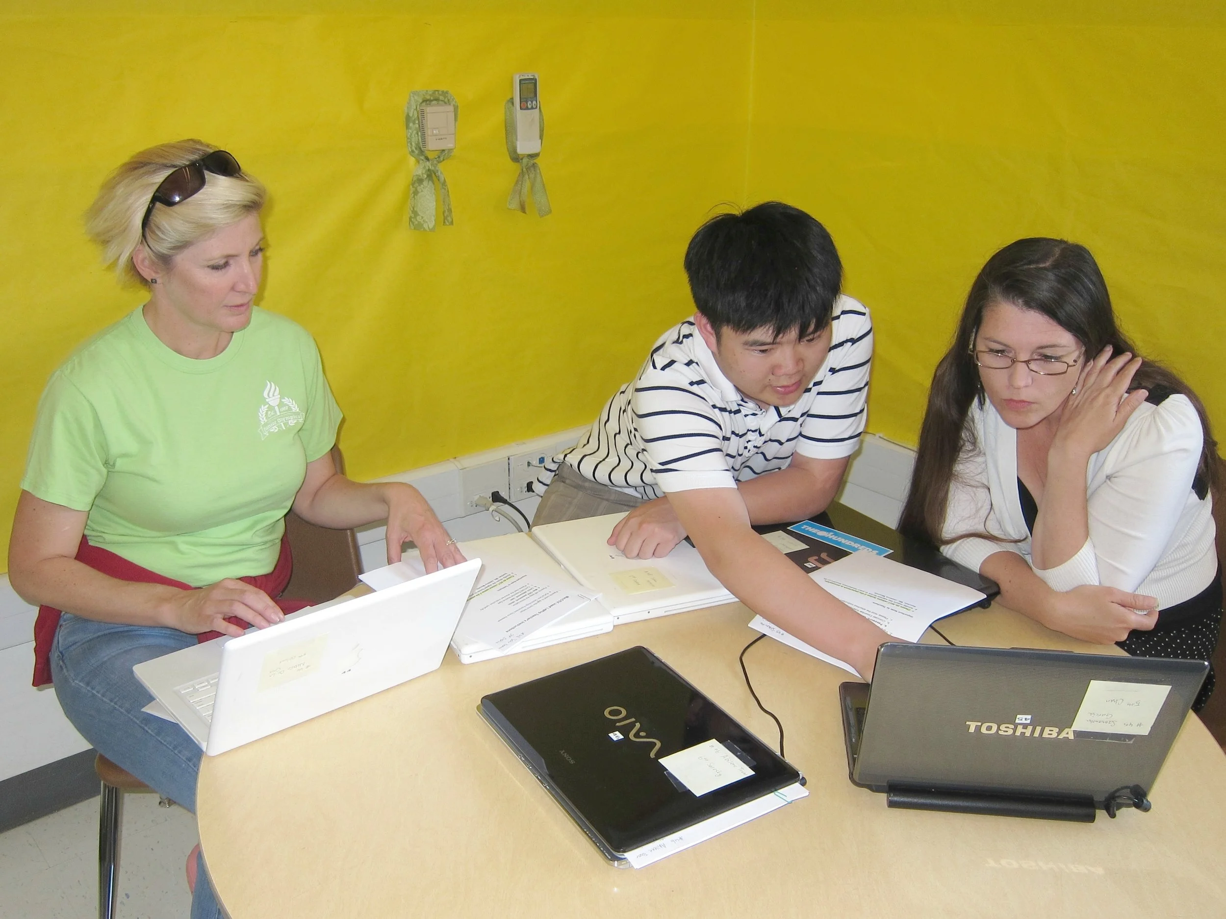 Refurbished laptops deployment: Erika Benadom, Almond School Principal, Terence Lee, EqOpTech Founder, Jessica Mountz, Almond School’s ELD Teacher (left to right)