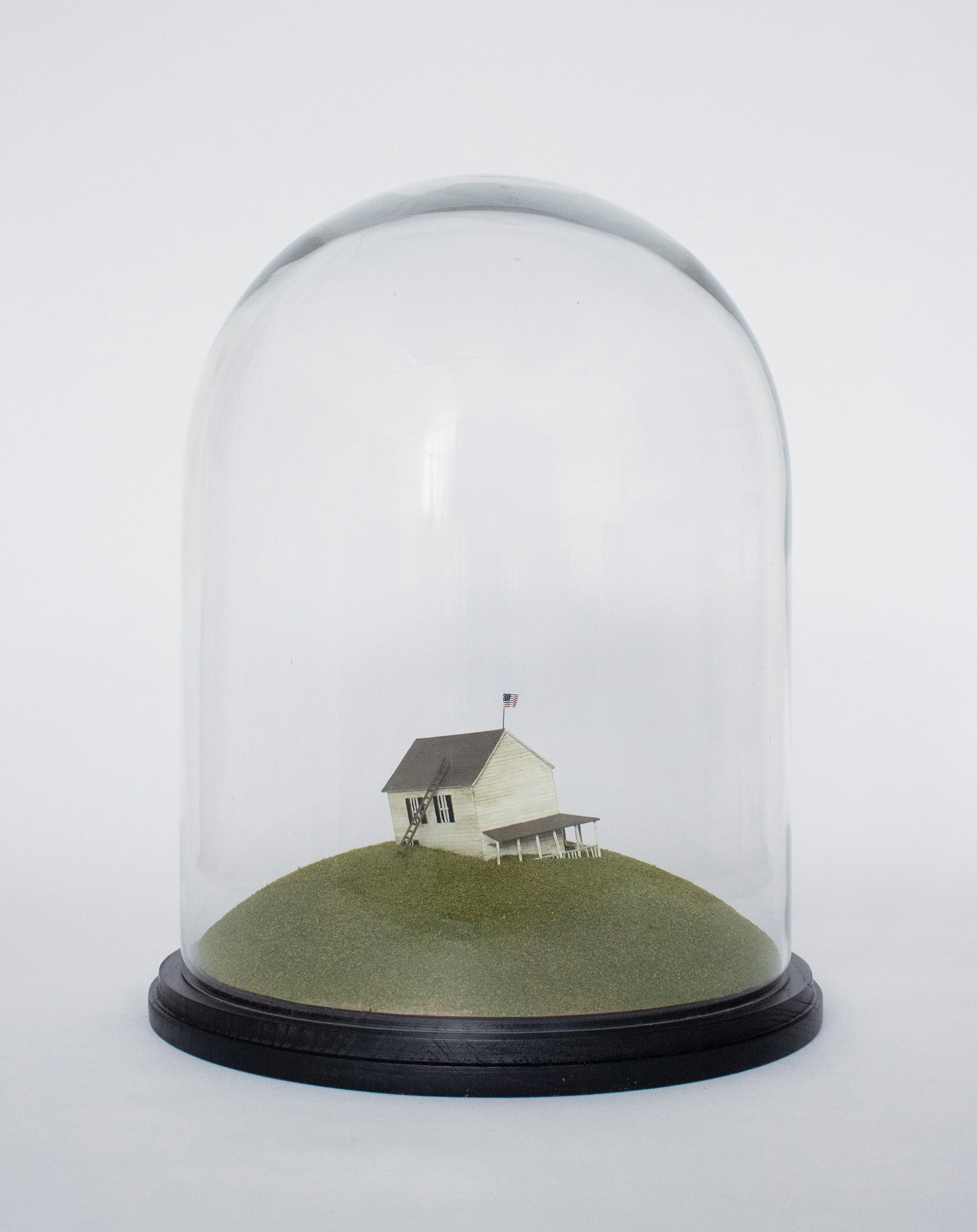 We Used to Live Here 2025 16 in x 13 in x 13 in Glass cloche, wood, foam, turf, wire, paper, acrylic, and enamel paint