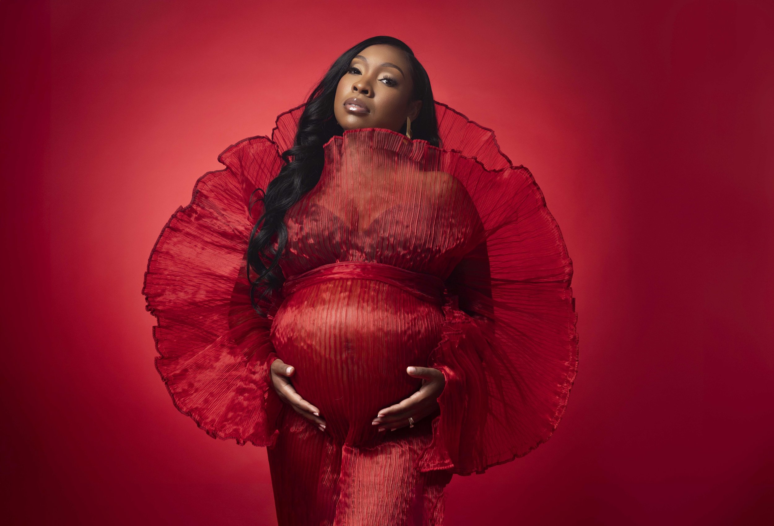 Couture red maternity gown studio portrait NYC