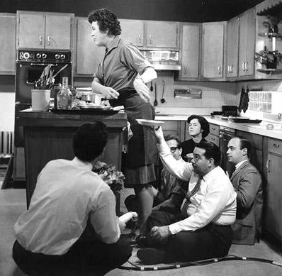 Julia Child and a TV crew during the taping of one of her shows. Photo: Paul Child
