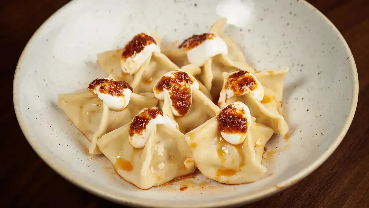 Istanbul MantiMeat ravioli with garlic sour cream and red pepper butter