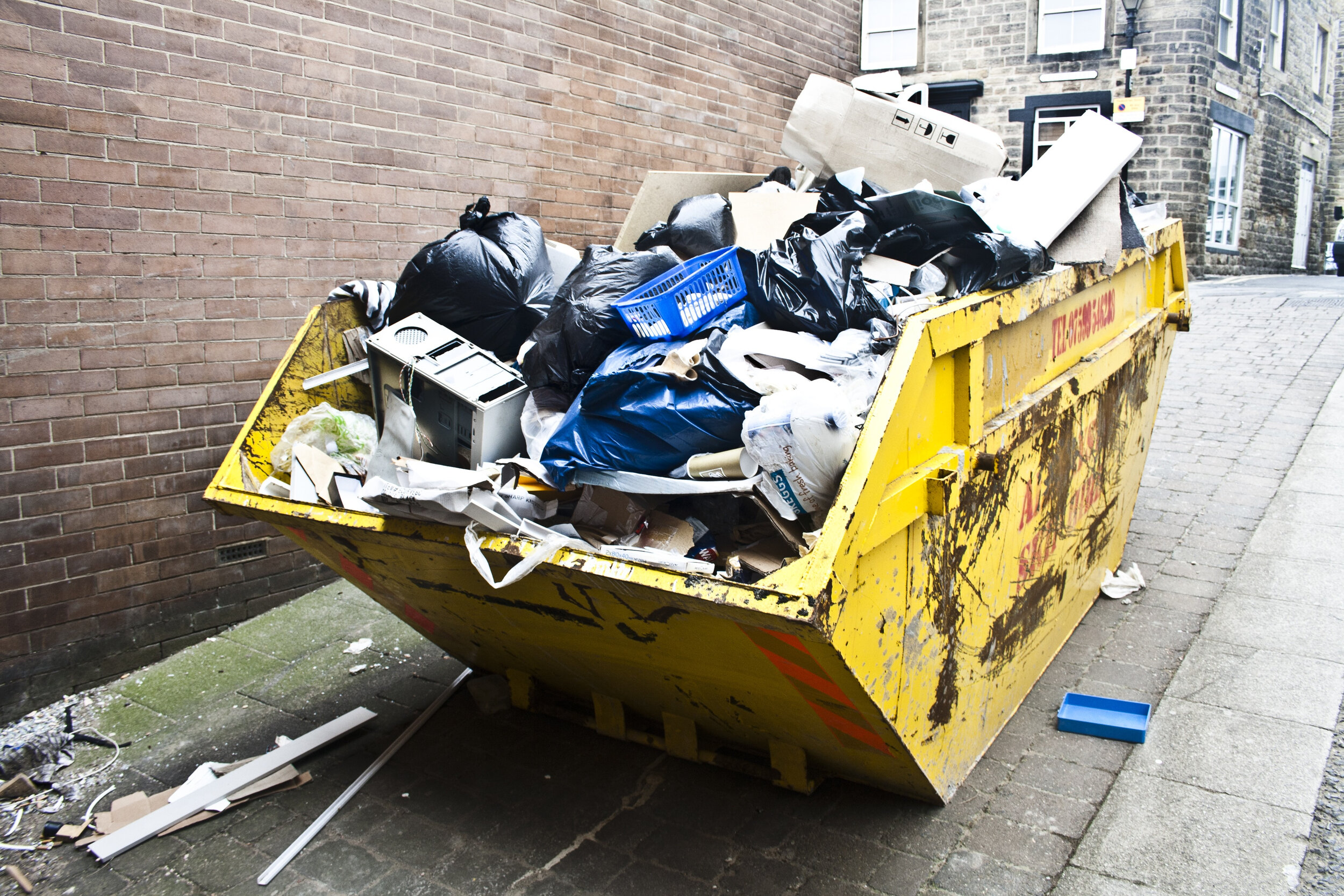 Canva - Community Waste Disposal.jpg