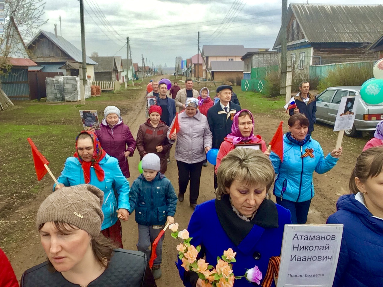 A Victory Day parade (бессмертный полк) in rural Udmurtia