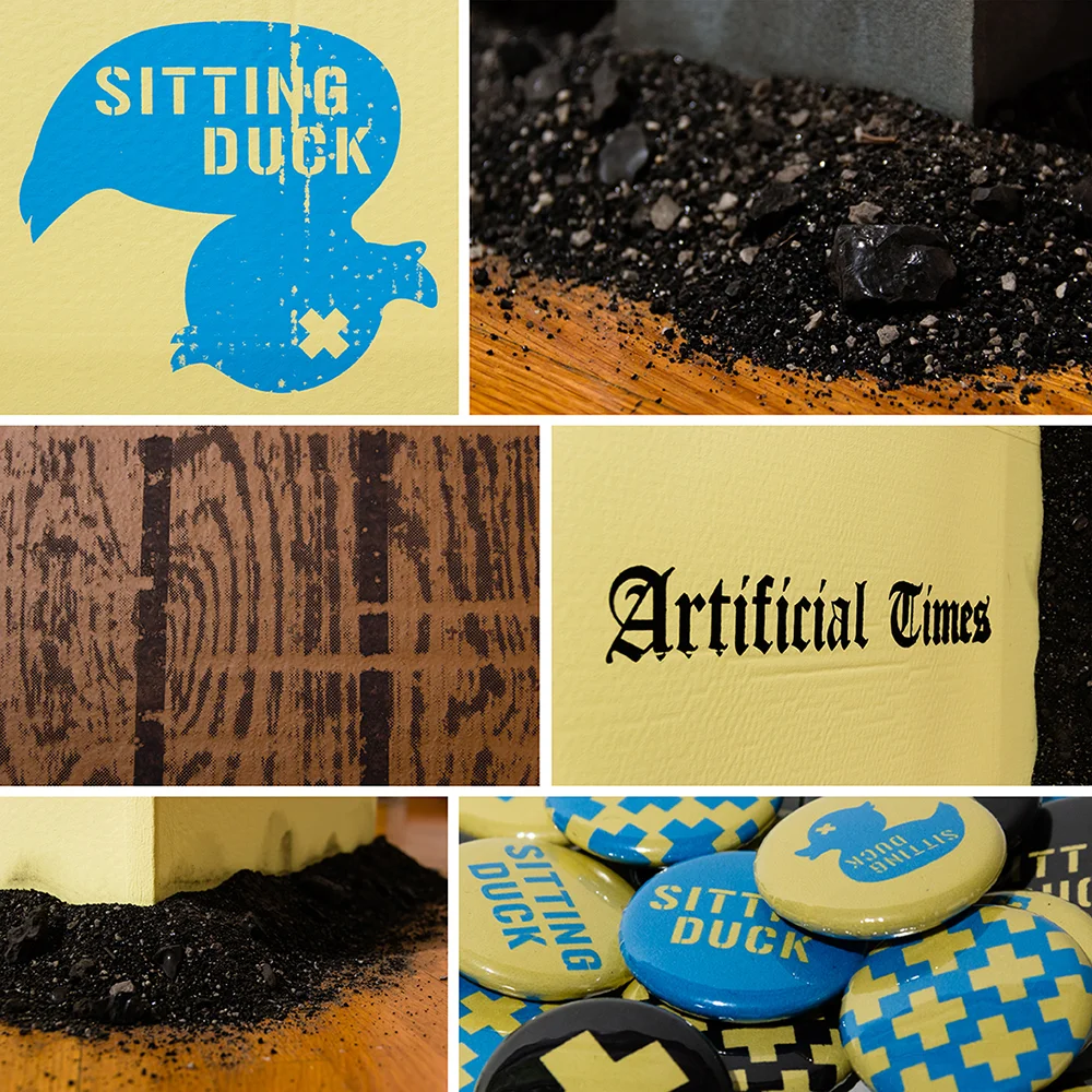 Close-up shots of cardboard newspaper dispenser, cardboard bench, real coal ash, and buttons.