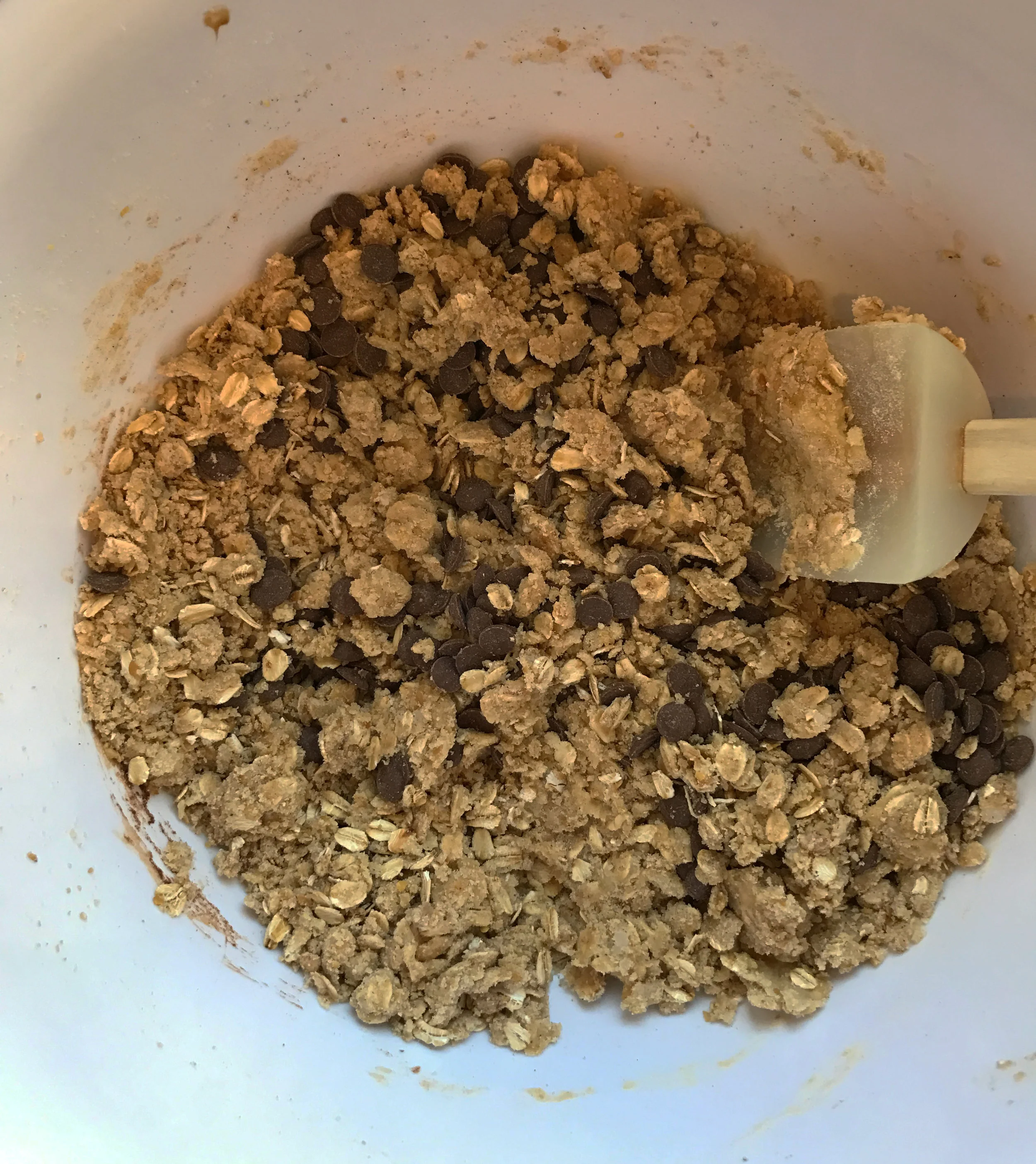 The dough almost looks like granola. This is the right consistency. Any more coconut oil and the cookies will be too greasy!
